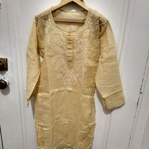 Sheer beige tunic with delicate embroidery